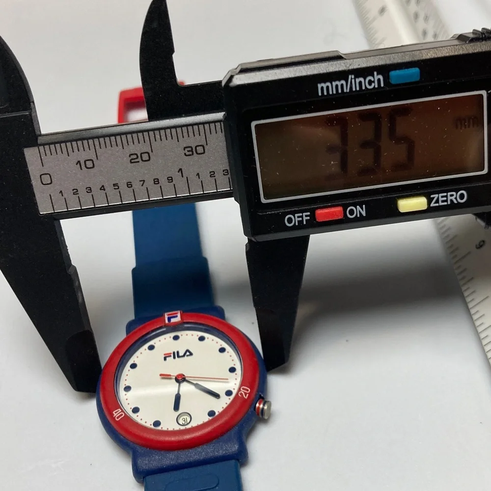 Fila vintage 95M watch, red white blue, new battery, rubber strap, date feature